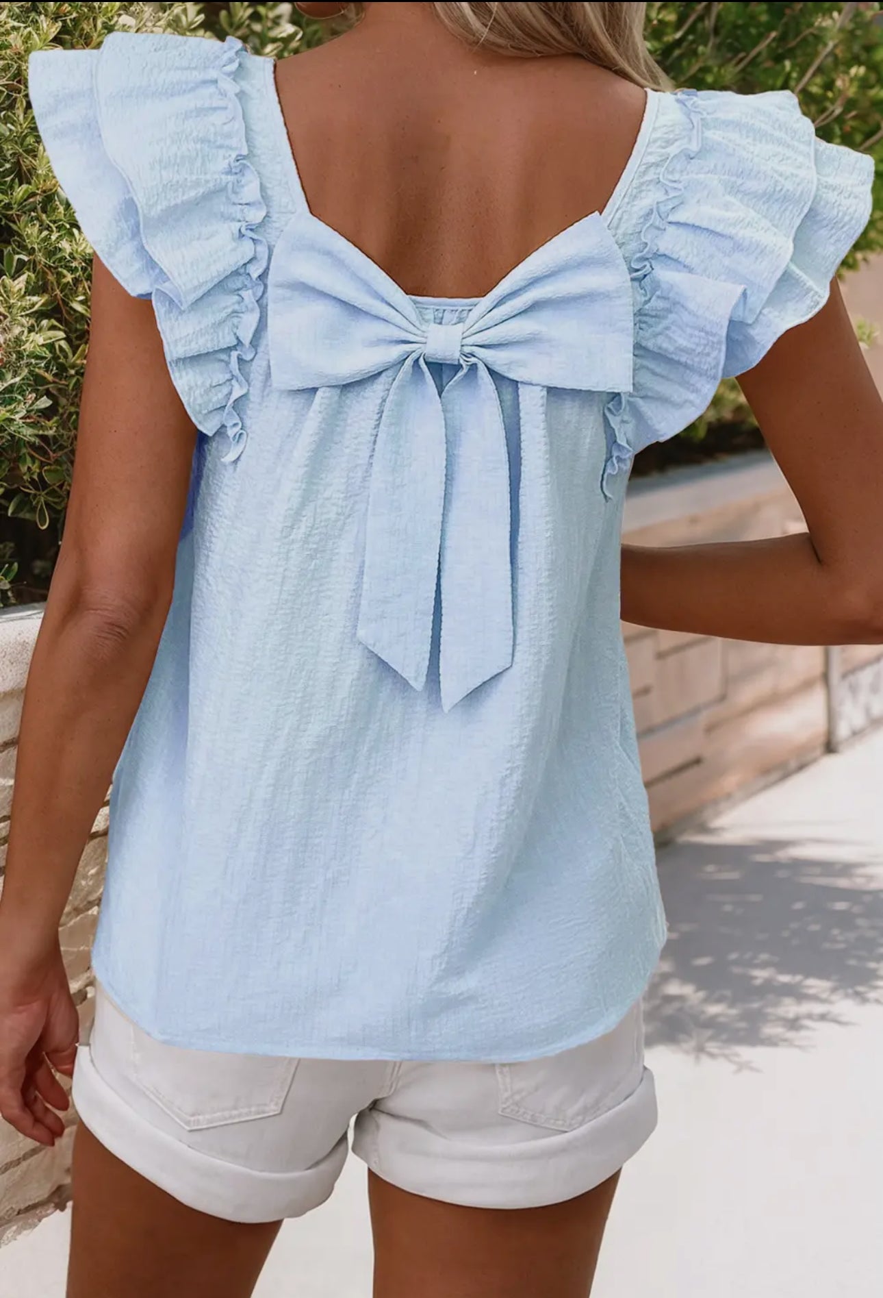 Blue bow blouse